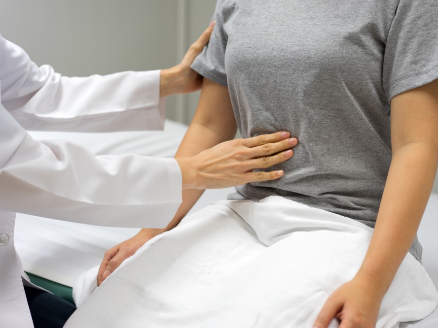 Female,Doctors,Are,Examining,By,Abdominal,Palpation,Of,Female,Patients