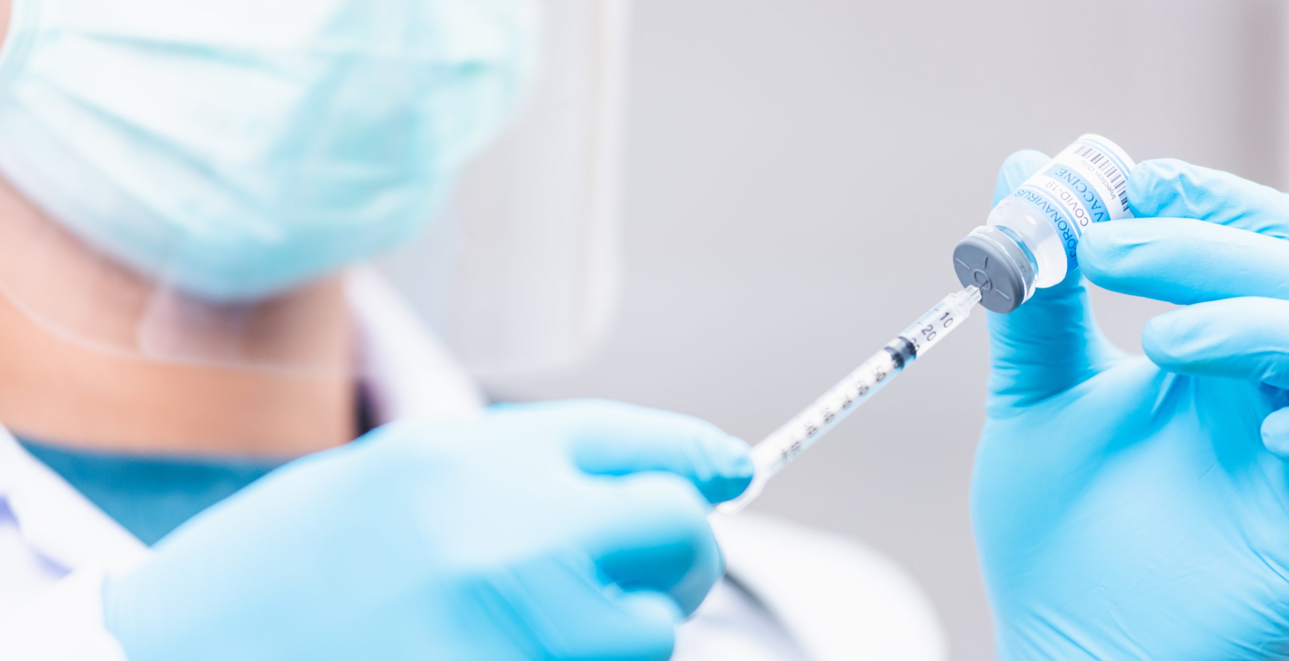 Covid-19,Vaccine,,Doctor,Man,Pull,Syringe,On,Liquid,Bottle,Covid-19