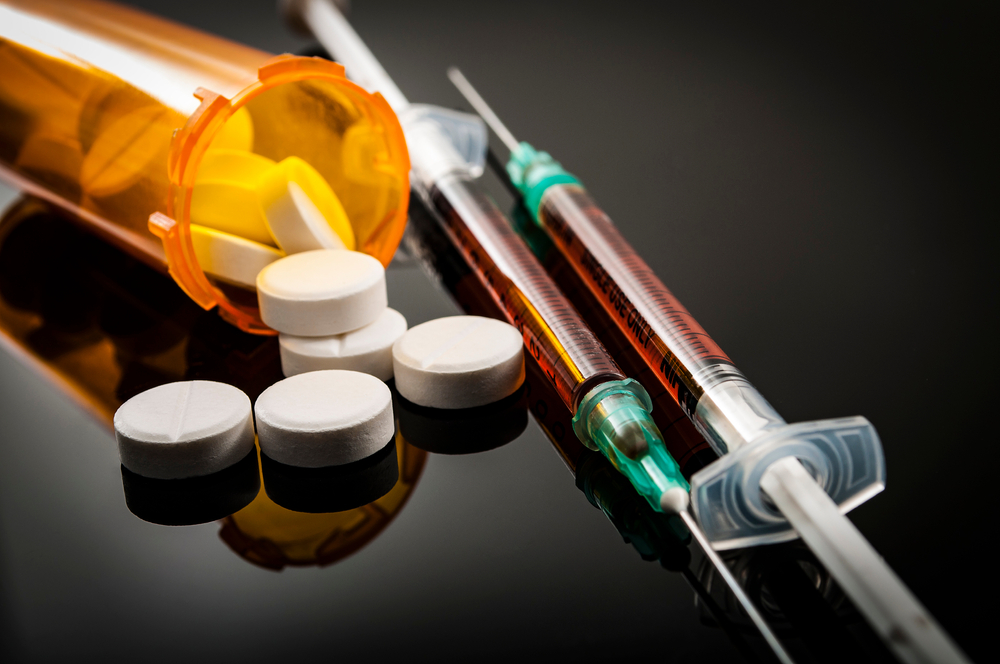 Opioid,Epidemic,,Drug,Abuse,Concept,With,Closeup,On,Two,Heroin