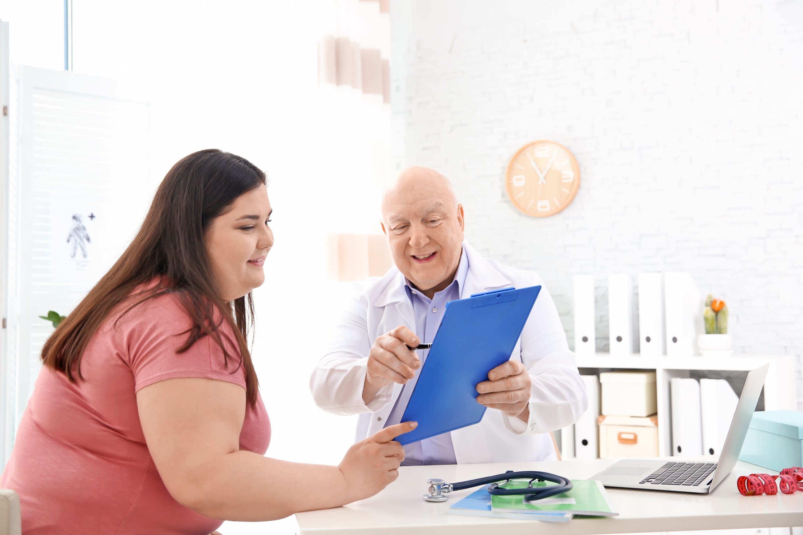 Overweight,Woman,Having,Consultation,At,Doctor's,Office