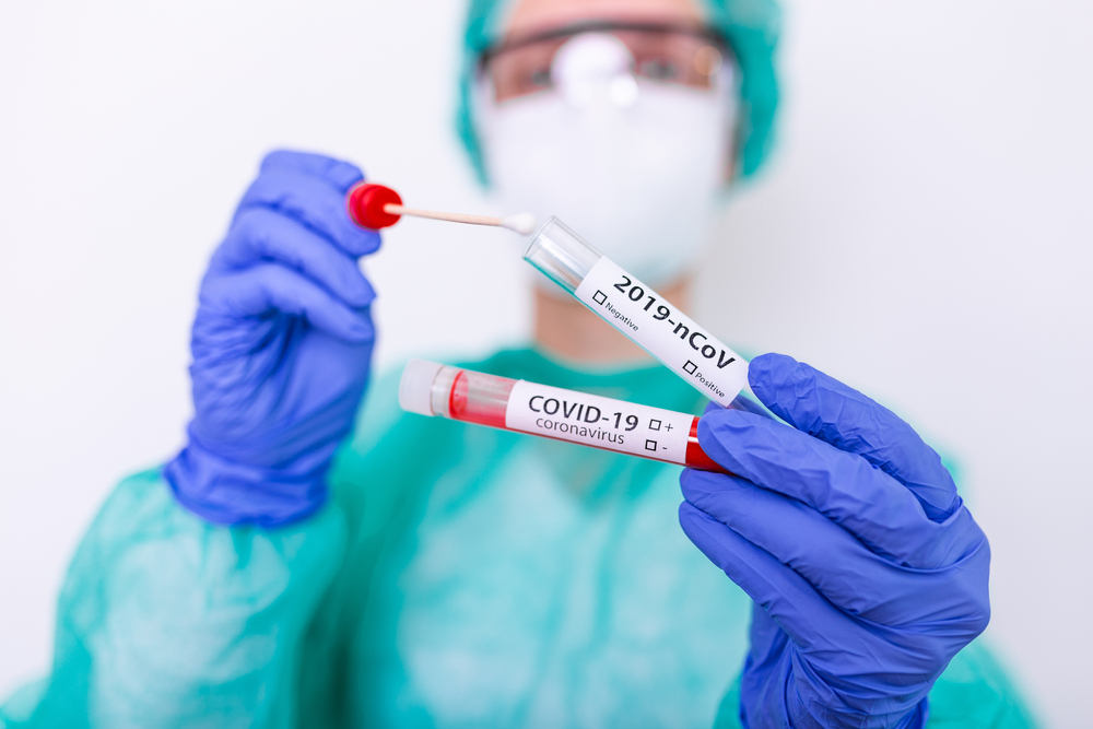 Covid-19,Nasal,Swab,Laboratory,Test,In,Hospital,Lab,,Nurse,Holding