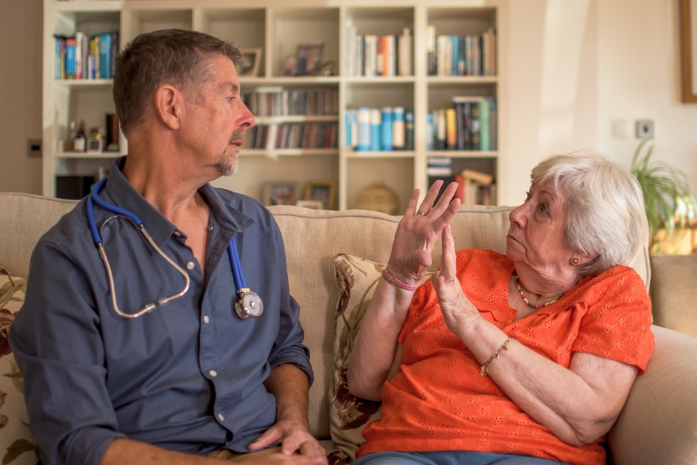 Angry,,Violent,Elderly,Dementia,Patient,,Holds,Up,Her,Hands,To