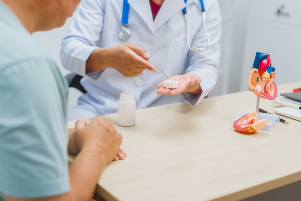 Asian,Male,Doctor,Specializing,In,Cardiology,Explains,Heart,Disease,To